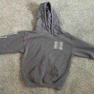 Grey starfit sweatshirt with pink lightning bolt on one sleeve